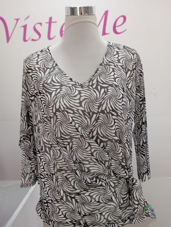 Blusa nudo